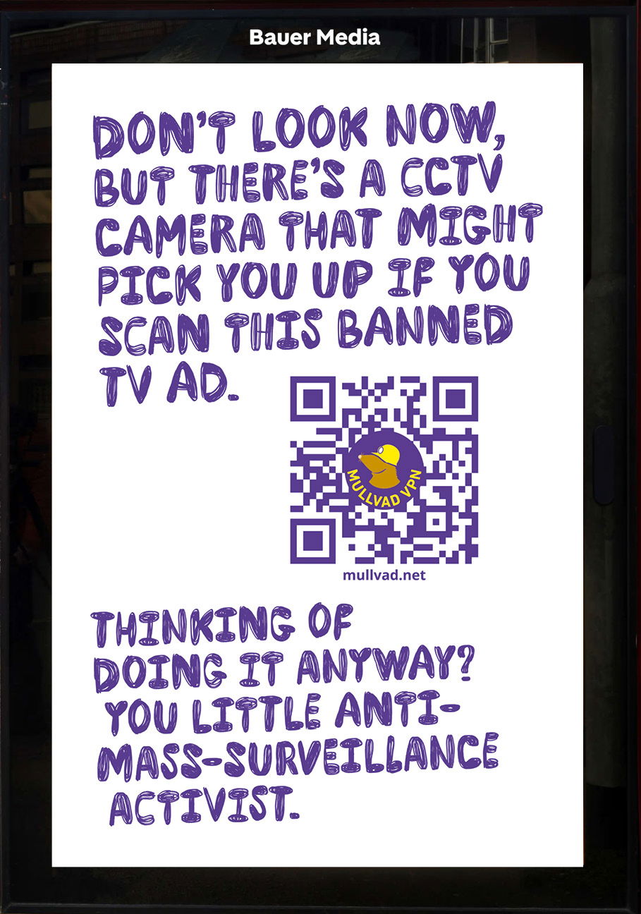Poster reads: "Don't look now, but there's a CCTV camera that might pick you up if you scan this banned TV ad." Footnote: "Thinking of doing it anyway? You little anti-mass-surveillance activist."